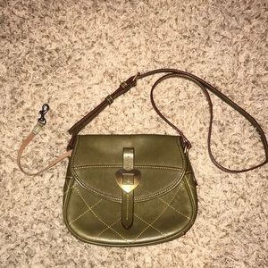 Dooney and Bourke olive Florentine leather crossbody it measures 7X9.5X3.5